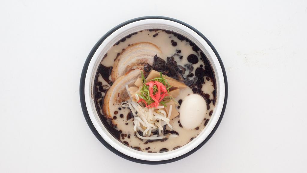 YUGO Ramen · Our signature ramen, made with a rich and creamy pork broth, Yugo house noodle, chashu pork, soft boiled egg, bamboo shoots, red ginger, kikurage mushroom, scallions, and black garlic oil.
