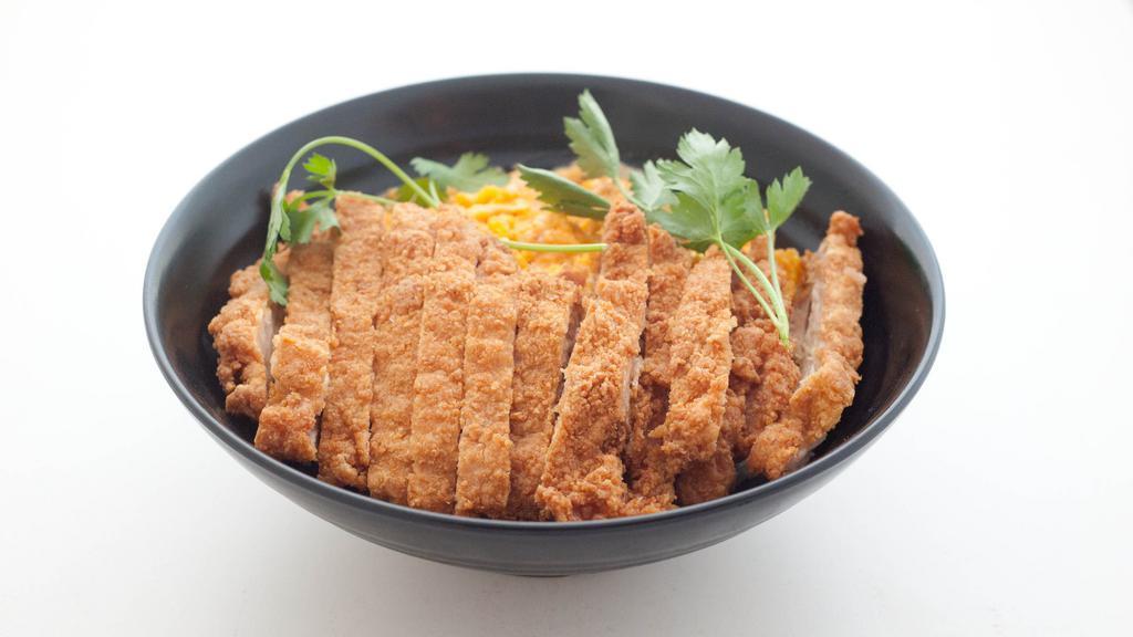 Chicken Katsu Don · Spicy. Deep fried chicken cutlet, egg, onion, scallions, and nori, served over rice.