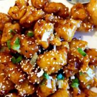 Princess Chicken · Deep-fried chicken, sauteed with garlic and green onions in a spicy sauce.