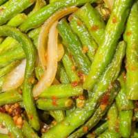Hot Spicy Green Beans · Fresh tender string beans sauteed and braised in a spicy garlic sauce.