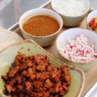 Family Style Al Pastor Tacos - 6 · Everything you need to assemble 6 tacos-. Grilled Coleman Ranch pork marinated in red chili,...