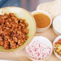 Family Style Al Pastor Tacos - 12 · Everything you need to assemble 12 tacos-. Grilled Coleman Ranch pork marinated in red chili...