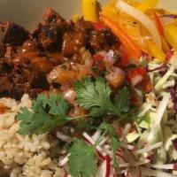 Al Pastor Bowl · Grilled red chili marinated Coleman Ranch pork, cilantro lime brown rice, roasted peppers, p...