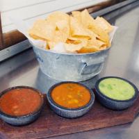 Chips and Housemade Salsa - Full Pint · Choice of Milagros red salsa, tomatillo salsa, or roasted pineapple salsa, served with sea-s...