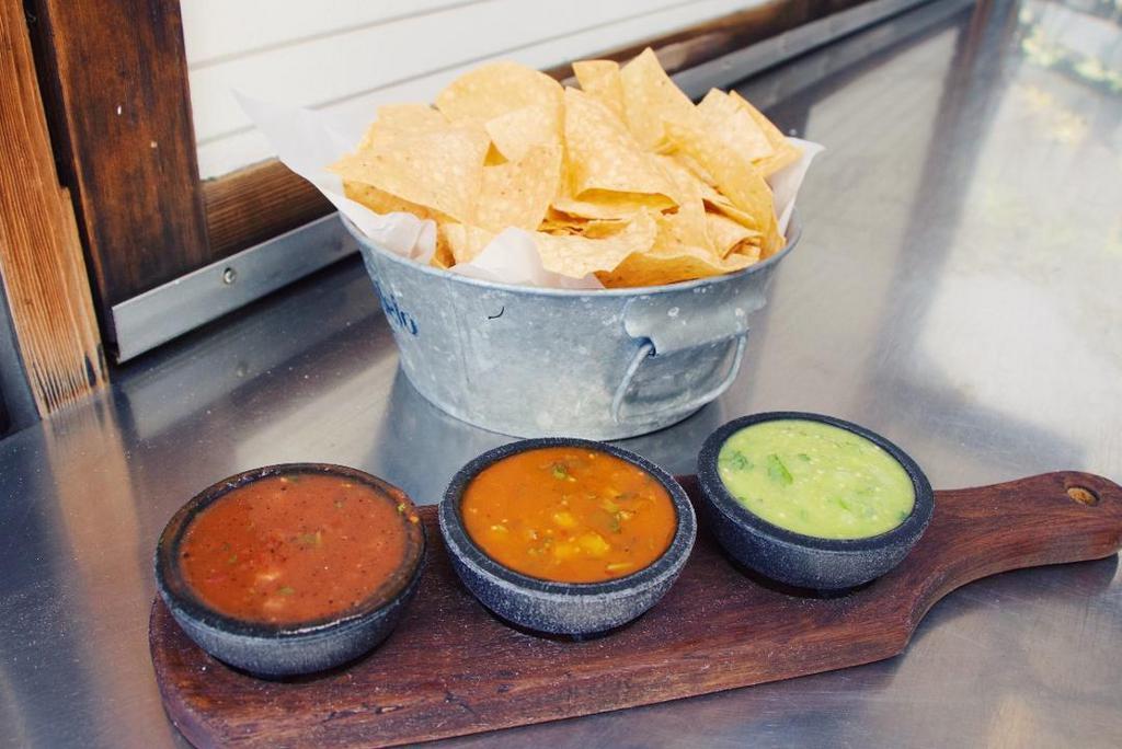 Chips and Housemade Salsa - Full Pint · Choice of Milagros red salsa, tomatillo salsa, or roasted pineapple salsa, served with sea-salt tortilla chips