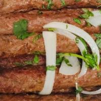 Beef Seekh Kabab · Ground beef blended with a rare selection of delicious herbs and spices. Barbecued on skewer...