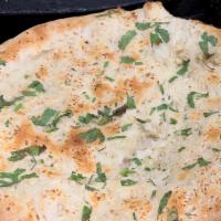 10. Garlic Naan · Bread stuffed with garlic and baked in a clay oven.