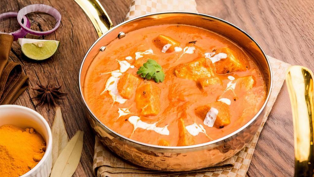 32. Shahi Paneer Masala · Homemade classic paneer cheese simmered in tomato, cream sauce.