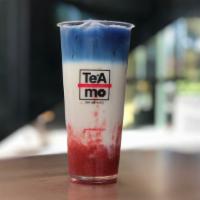 RWB Latte · Red white and blue. House-made strawberry purée, organic milk, topped with butterfly pea tea.