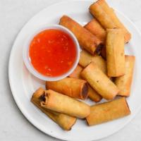 Lumpiang Shanghai (12 Pcs.) · Deep-fried egg rolls with ground pork and shrimp served with chili sauce.