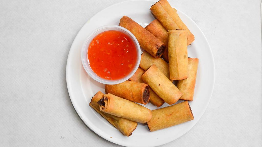 Lumpiang Shanghai (12 Pcs.) · Deep-fried egg rolls with ground pork and shrimp served with chili sauce.