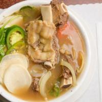 Sinigang · Traditional tamarind-based sour soup with your choice of pork ribs, beef ribs, shell-on shri...