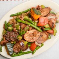 Pinakbet · Mixed vegetables sautéed with pork in shrimp paste.