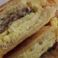 Breakfast Sandwich · Egg, cheese, choice of ham, bacon , sausage, or vegetarian