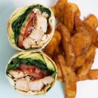 Spiced Chicken Wrap · Grilled spiced chicken breast, baby kale, sheep's milk feta, avo smash, heirloom tomato and ...