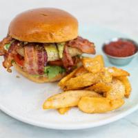 Classic Chicken & Bacon Club Roll - Wedges · Oven-roasted chicken, bacon, avocado, tomato & chimichurri mayo on a brioche roll served wit...