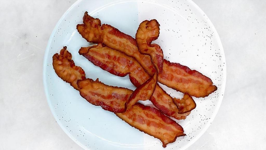 Side Bacon · Side of crispy bacon.