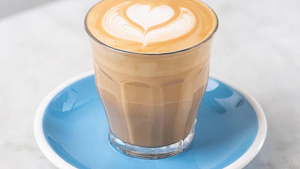 Latte · The global café favorite. Double espresso with steamed, silky textured milk and one inch of velvety micro-foam.