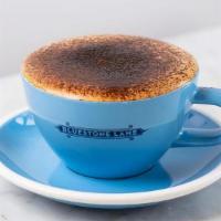 Cappuccino · Double espresso with steamed milk and slightly more microfoam than a latte with cocoa dustin...