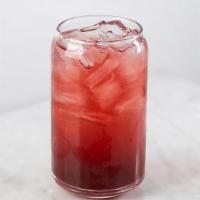 Iced Spring Trellis Tea · Green rooibos, raspberry, lemon peel and hibiscus. This non-caffeinated cold brewed tea is t...