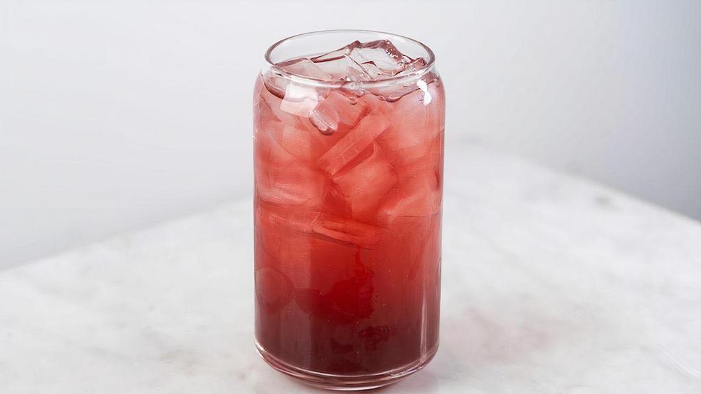 Iced Spring Trellis Tea · Green rooibos, raspberry, lemon peel and hibiscus. This non-caffeinated cold brewed tea is tart and refreshing with natural sweetness. Plus, it's full of antioxidants to help toxin release and promote healthy skin.
