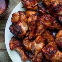 BBQ Wings · Mouthwatering Golden Chicken wings, served in a BBQ flavor.