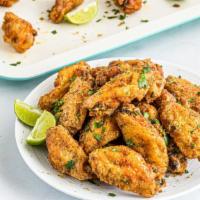 Lemon Pepper Wings · Deep fried chicken wings marinated in a citrusy and peppery blend. Your choice of 6, 12, 18 ...