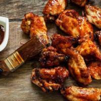 Honey BBQ Wings · Mouthwatering Golden Chicken wings, served in a Honey BBQ flavor.