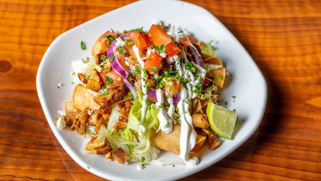 Flautas · Three crispy rolled corn tortillas filled with potato, and topped with your choice of meat, lettuce, queso fresco, pico de gallo and sour cream.