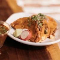 Quesabirria · Three Tortillas dipped in birria consomme stuffed with cheese,onions,cilantro, and shredded ...