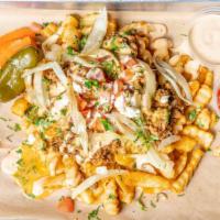 Taco Loaded Fries · Seasoned fries loaded with shredded cheese, house queso, ground beef, pico de gallo, grilled...