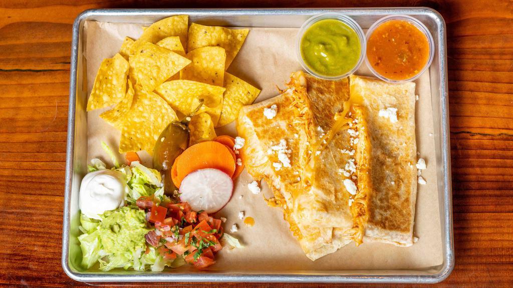 Quesadilla · A flour tortilla filled with monterey jack cheese and your choice of meat. With a side of lettuce, pico de gallo, sour cream, and guacamole.
