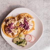Baja Tacos  · Beer Battered Fish or Shrimp served on a corn tortilla topped with coleslaw, onions, and chi...