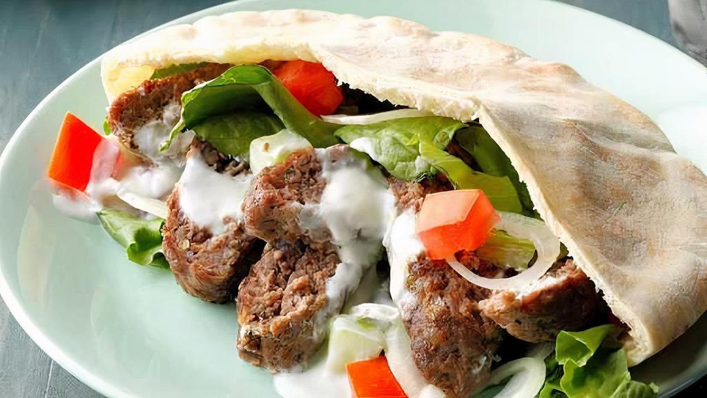 Falafel Mediterranean Wrap · Meatless sandwich made from chickpeas and spices.