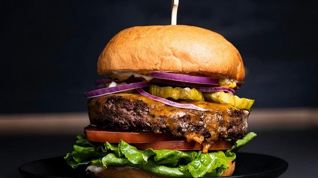 THE ORIGINAL · 1/2 lb Wagyu Beef Patty, Cheddar Cheese, Green Leaf, Pickles, Red Onions, Tomatoes, Mayonnaise, Yellow Mustard