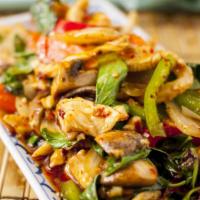 36. Sweet Basil Chicken · Spicy. Sliced chicken sauteed with fresh chili, onion, mushrooms, carrot, bell peppers and s...