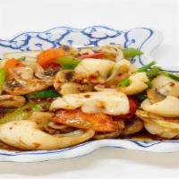 56. Fresh Chili Calamari · Spicy. Calamari sauteed with fresh chili, mushrooms, carrot, bell peppers, onion and green o...