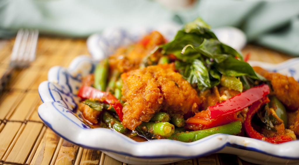 Spicy Catfish · Deep Fried Catfish then Stir-Fried with Red Curry, Red Bell Pepper, and Kaffir Lime Leaf, Topped with crispy basil.