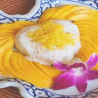 Sticky Rice with Mango · Sweet Mango, Sweet Sticky Rice mixed with Coconut Cream Topped with a sprinkle of Sesame See...