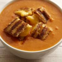 Tomato Basil Soup · Comes with grilled cheese croutons.