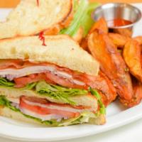 Turkey Club · A double decker sandwich with bacon, turkey, tomato, lettuce, onions, mayo on slice pullman ...