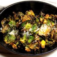 Brussel Sprouts · Marinated fried brussel sprouts with pecorino romano & lemon.