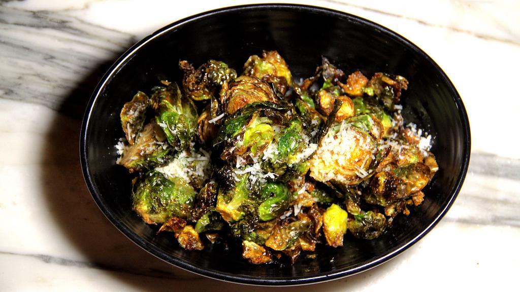 Brussel Sprouts · Marinated fried brussel sprouts with pecorino romano & lemon.