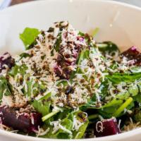Beet Salad · Roasted beets with baby spinach, salted ricotta & extra virgin olive oil.