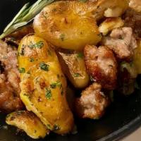 Potatoes and Sausages · Roasted potatoes and Italian Sausages  rosemary