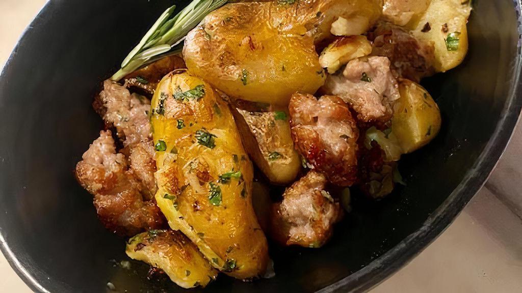 Potatoes and Sausages · Roasted potatoes and Italian Sausages  rosemary