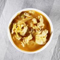 #16. Tom Ka · Coconut soup with lemon grass, galangal, kaffir lime leaf and mushrooms.