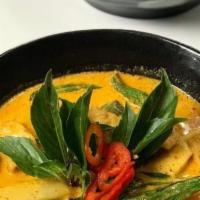 #44. Red Curry · Choice of meats, green beans, bamboo shoots, eggplants, bell peppers and basil.