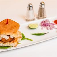 Bombay Vada Pav · Spiced potato ball sandwiched between two slices of pav served with chutneys.
