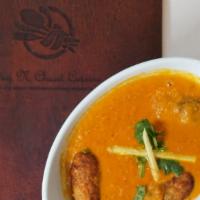 Malai Kofta · Vegetable dumplings cooked with herbs and spices in a creamy sauce.